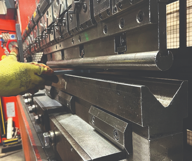 Close up of metal bending process